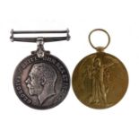 Two British Military World War I medals comprising a victory medal awarded to MAJORC.L.WILKINSON and