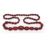 Amber coloured bead necklace, 80cm in length : For Extra Condition Reports Please visit our Website