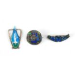 Two Arts & Crafts silver and enamel brooches and a pendant, including a brooch by Charles Horner,