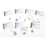 Silver jewellery set with semi precious stones, with certificates including blue topaz, American