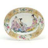 Chinese porcelain oval dish finely hand painted in the famille rose palette with three females,