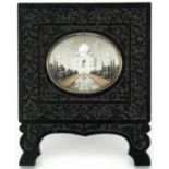 Indian oval miniature finely hand painted with The Taj Mahal, housed in an ebony easel frame