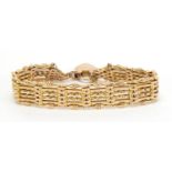 9ct rose gold six row gate bracelet, with love heart shaped padlock, 17cm in length, approximate