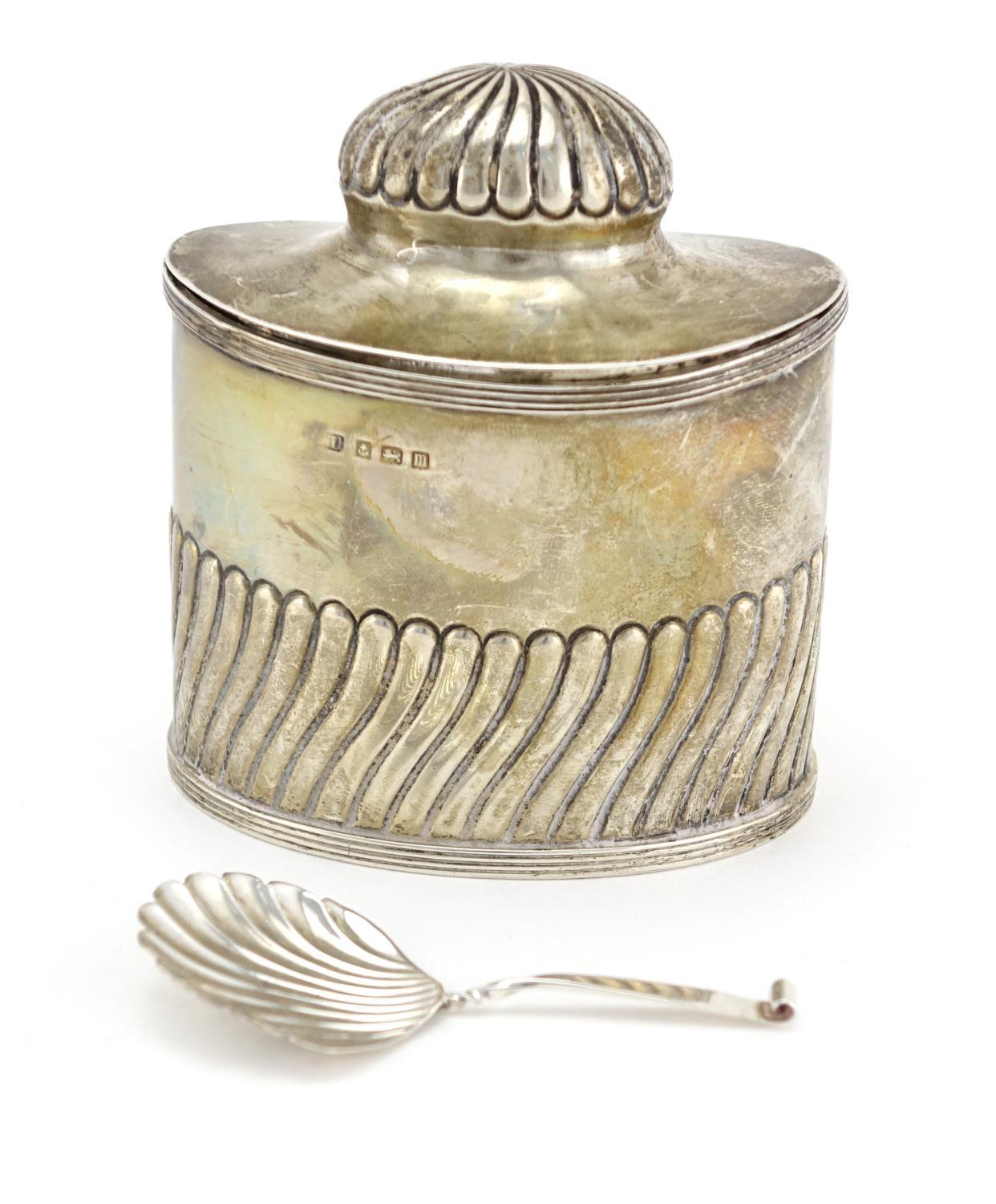 Silver demi fluted tea caddy with fitted spoon to the interior and hinged lid, indistinct makers - Image 4 of 6