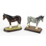 Two Royal Doulton horses with stands and boxes, Clydesdale RDA 55 and Shire RDA 26, the largest 21cm