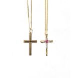 Two 9ct gold cross pendants on 9ct gold necklaces, one set with a ruby and diamonds, approximate