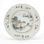 Chinese porcelain shallow dish, hand painted in the famille rose palette with a river landscape,