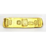 Chinese gold coloured metal scroll weight, 8.2cm wide, approximate weight 82.9g : For Extra