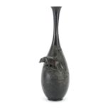 Japanese patinated bronze vase cast in relief with a wolf, character marks to the base, 32cm