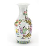 Chinese porcelain vase, hand painted in the famille rose palette with children around peach trees,