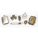 Silver and white metal jewellery including a Victorian vesta, hard stone clover brooch and
