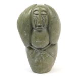 Modernist stone carving of a figure holding his hands on his head, 47cm high : For Extra Condition