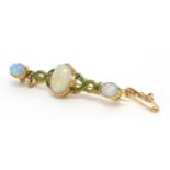 Victorian unmarked gold opal and green enamel bar brooch, 4.5cm in length, approximate weight 5.3g :