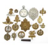 Group of British Military cap badges and a Military issue Leonidas pocket watch : For Extra