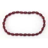 Cherry amber coloured bead necklace, 30cm in length, approximate weight 13.8g : For Extra