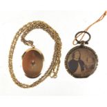 15ct gold back and front locket, set with a central diamond and a gilt metal mourning locket : For