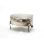 Silver four footed jewel box, the hinged lid with engine turned decoration, I J C Birmingham 1919,