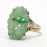 Chinese silver and green jade ring carved with a bird amongst flowers, size L, approximate weight