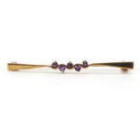 9ct gold amethyst bar brooch, 5cm in length, approximate weight 2.1g : For Extra Condition Reports