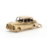 Large 9ct gold saloon car charm, 4cm in length, approximate weight 11.5g : For Extra Condition