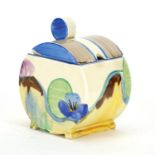 Clarice Cliff Newport pottery jam pot and cover, hand painted in the Pansy Delicia pattern, 10.5cm