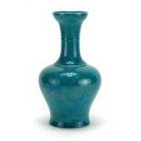Chinese turquoise glazed porcelain vase, incised with flowers and foliate scrolls, six figure