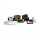 Vintage cameras and accessories including a green vest pocket ready set and Voightlander Perkeo :