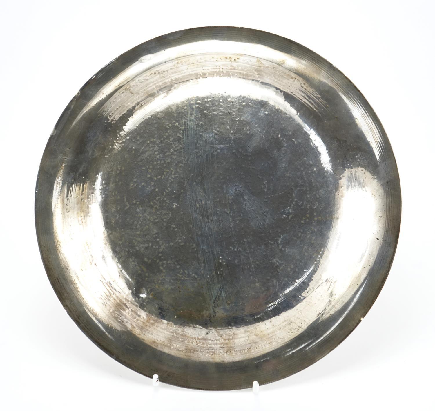 Islamic unmarked silver dish, engraved with script and foliate motifs, 23cm in diameter, approximate - Image 3 of 3
