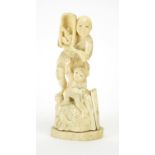 Japanese carved ivory okimono of a fisherman and young boy, 18cm high : For Extra Condition