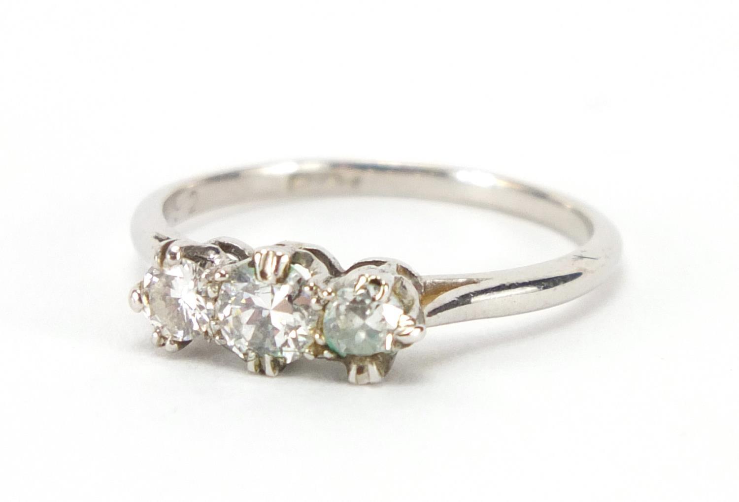 Platinum diamond three stone ring, size L, approximate weight 2.5g : For Extra Condition Reports
