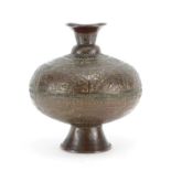 Middle Eastern bronze vase possibly Tibetan, incised and decorated in low relief with mythical