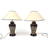 Pair of Italian porcelain table lamps with shades, hand gilded and transfer printed with females