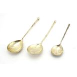 Pair of Russian silver spoons and one other, each marked 84 to the stems, the largest 19.5cm in