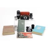 Ernst Leitz Leica camera body with accessories including elmar F=9cm 1:4 and Hektor F=13,5cm 1:4,5