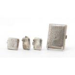 Rectangular silver cigarette case and three vesta's, various Birmingham hallmarks, the largest 8cm