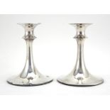 Pair of Norwegian silver circular based candlesticks of tapering form by David Andersen, 15cm