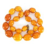 Butterscotch amber coloured graduated bead necklace, 40cm in length, approximate weight 39.6g :