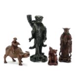 Chinese hardwood carvings including a root carving lamp base and boy on a buffalo, the largest