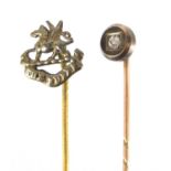 Unmarked gold diamond tie pin and a gilt metal Military example, the largest 5cm in length : For