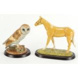 Two Royal Doulton animals with stands and boxes, Palomino RDA 31 and Barn Owl RDA 37, the largest