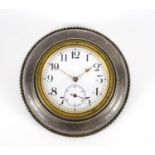 Victorian circular silver desk clock with enamelled dial and Arabic numerals by Henry Williamson