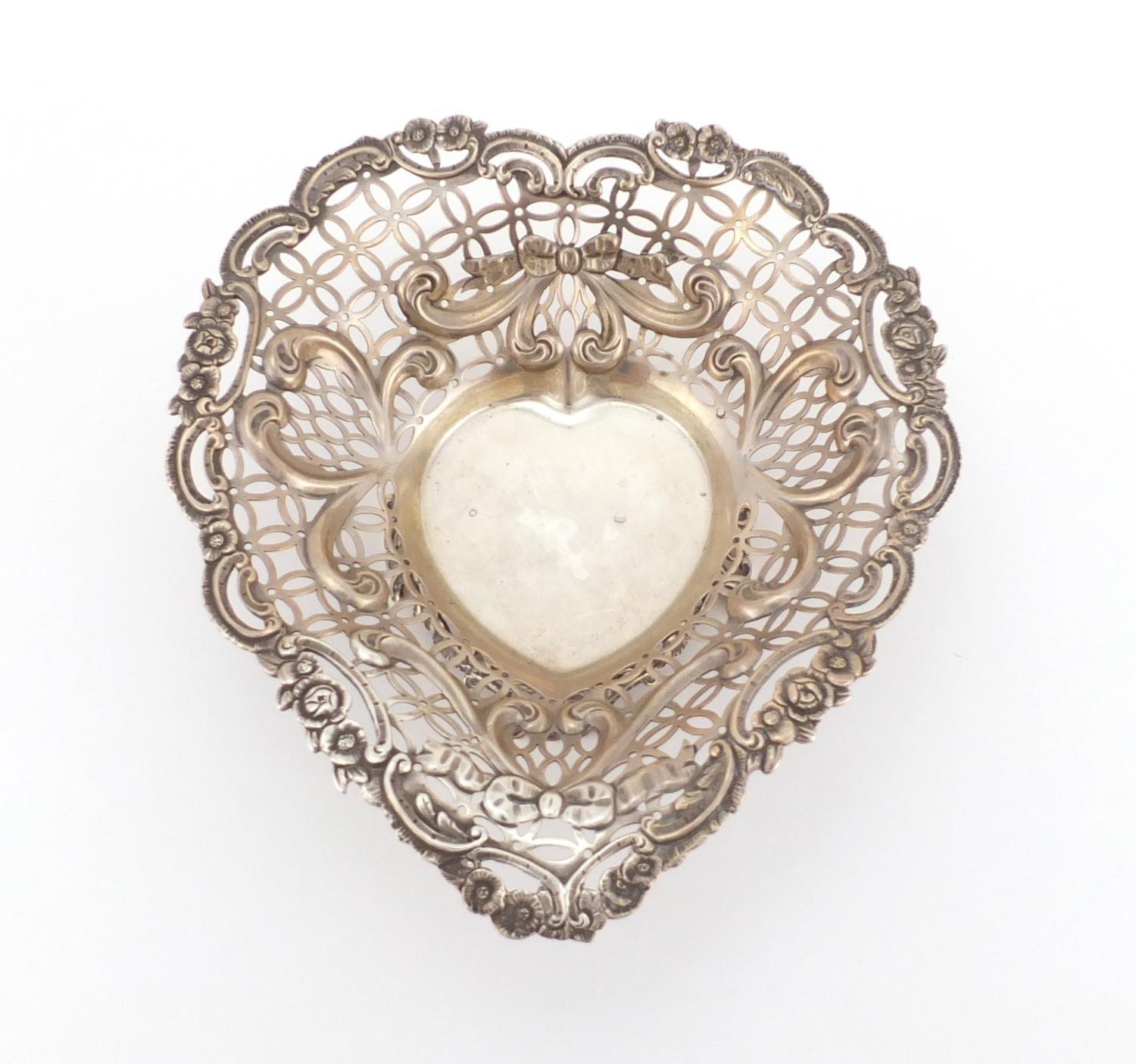 Victorian silver dish of love heart form with pierced and floral decoration, by William Comyns,