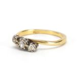 18ct gold diamond three stone crossover ring, size K, approximate weight 2.1g : For Extra