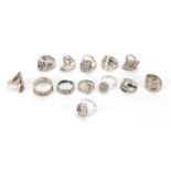 Thirteen white metal rings, each stamped 925 some set with clear stones, approximate weight 83.