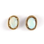 Pair of 9ct gold cabochon opal earrings, 1cm in length, approximate weight 1.6g : For Extra