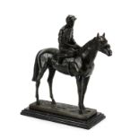 Bronze study of a jockey on horseback, raised on a rectangular black marble base, 33.5cm high :