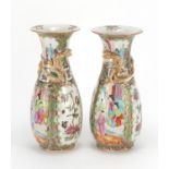 Pair of Chinese porcelain Canton vases decorated in relief with lizards, each hand painted in the
