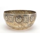Arts & Crafts circular silver footed bowl, embossed with stylised motifs, by Fenton Brothers Ltd,