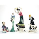 Four Art Deco hand painted pottery figurines, the largest of a Spanish dancer, each with impressed