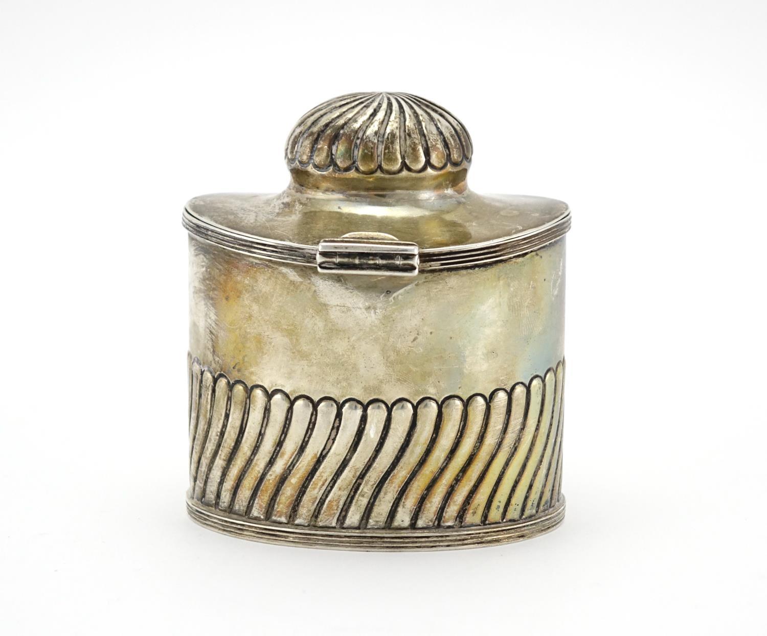 Silver demi fluted tea caddy with fitted spoon to the interior and hinged lid, indistinct makers - Image 2 of 6